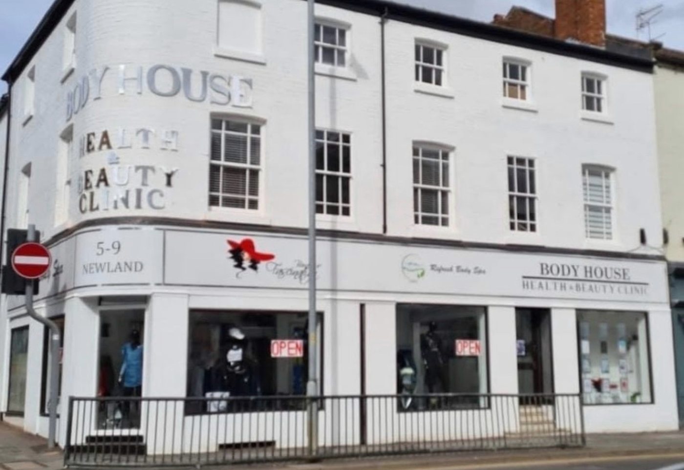 The white corner building at 5-9 Newland, Lincoln, with Body House Health and Beauty Clinic signage